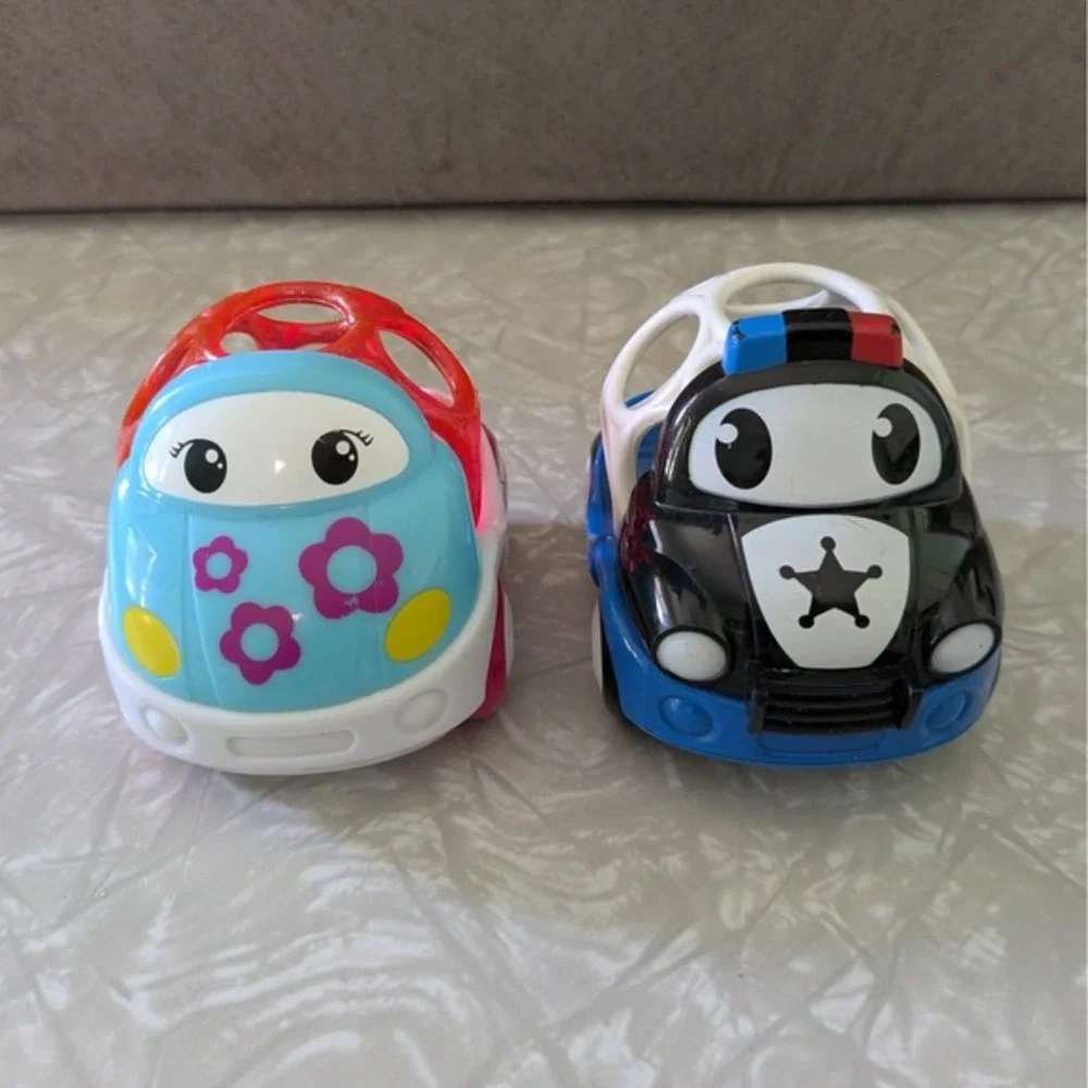 Bright Starts Oball Go Grippers Toy Car Set Floral and Police Cruiser 2 Pack